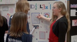Faith talks about her science display.